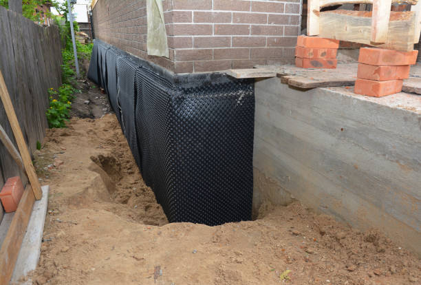 Happy homeowners after waterproofing job in Mooresburg